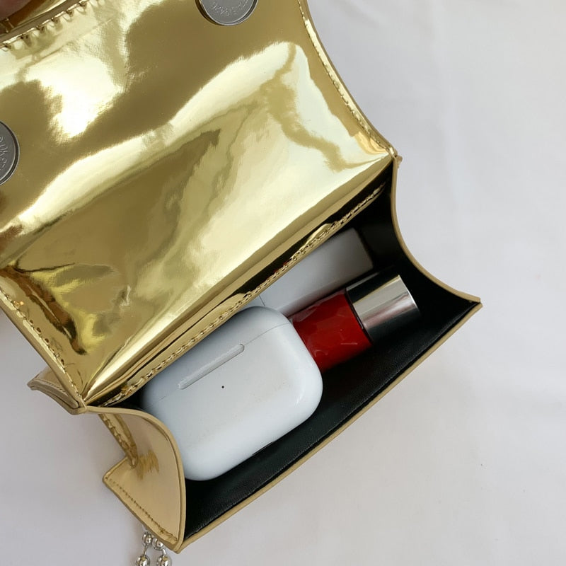  Bolsa de Couro Metalizada com Alça Corrente