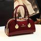 Bolsa Feminina Tiracolo Envernizada